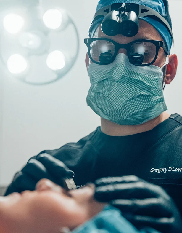 Dr. Lewen performing revision eyelid surgery